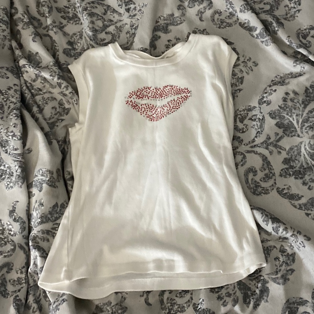 A red,lip tank top and plain white tank